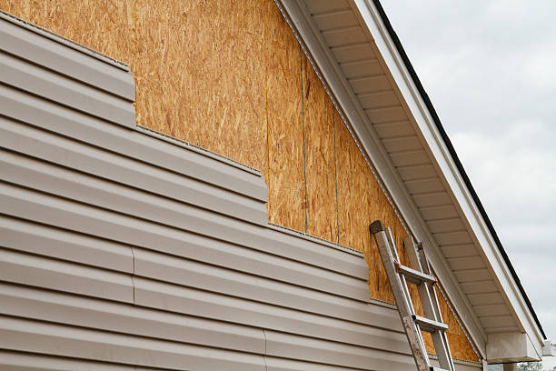 Professional Storm Damage Siding Repair technician working in Moncure, NC
